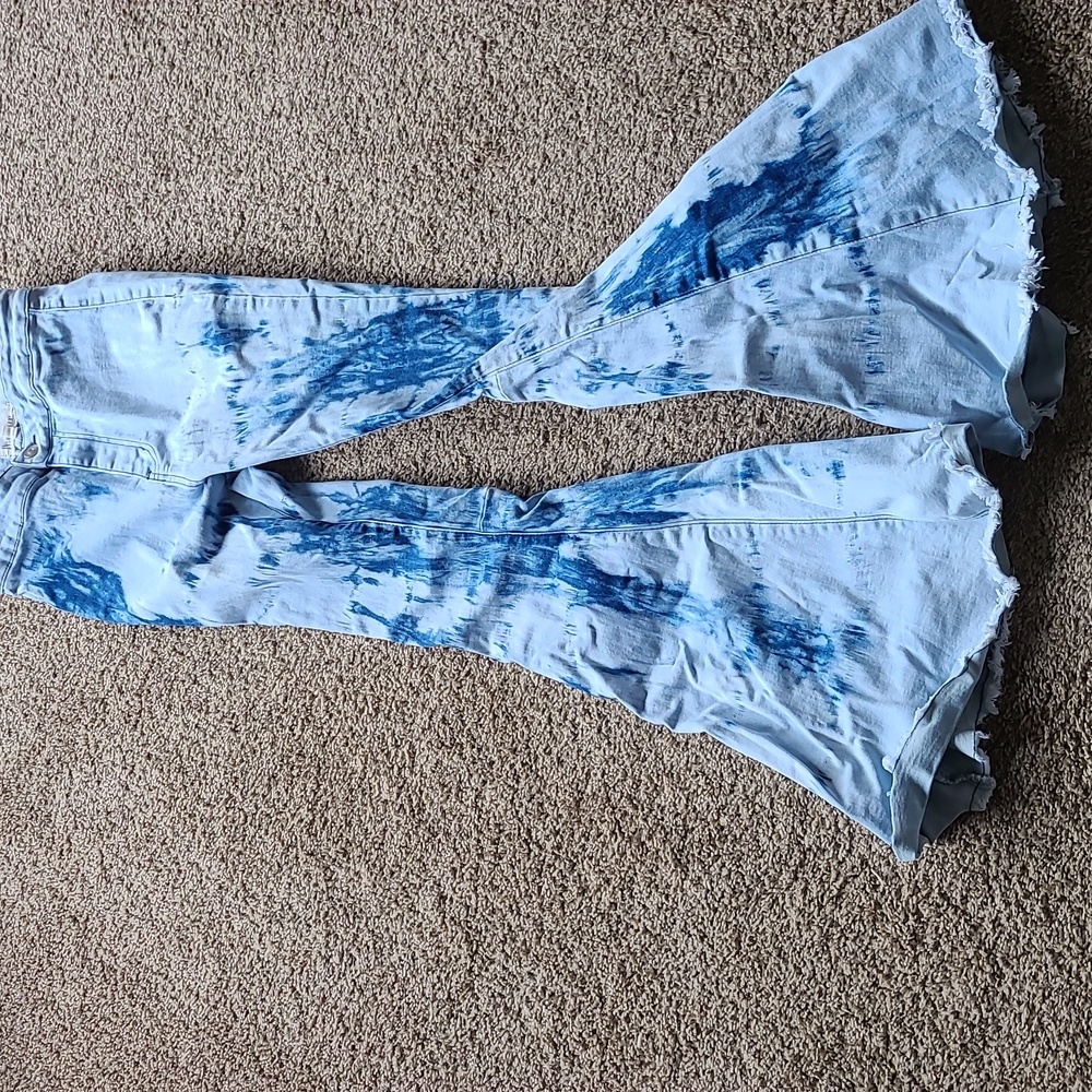 Acid wash bell bottom jeans